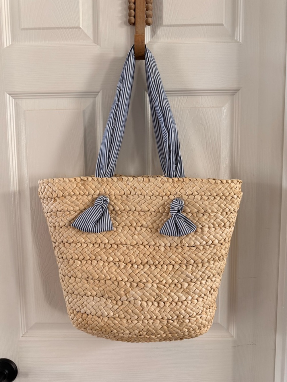 Woven Straw Tote with Navy Stripe Handles and Tassels